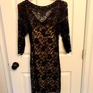 Short lace dress with tan slip